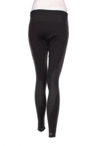 Damskie legginsy Decathlon, Rozmiar L, Kolor Czarny, Cena 73,57 zł