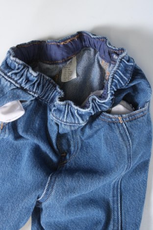 Dziecięce jeansy H&M, Rozmiar 9-12m/ 74-80 cm, Kolor Niebieski, Cena 37,13 zł