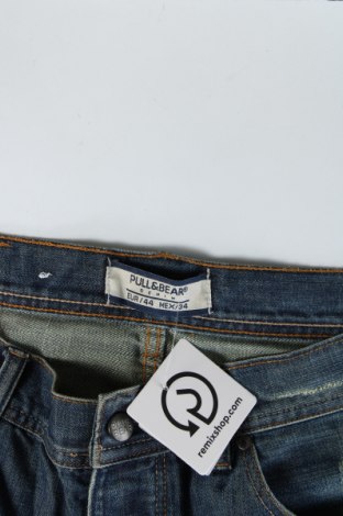 Męskie jeansy Pull&Bear, Rozmiar XL, Kolor Niebieski, Cena 46,99 zł