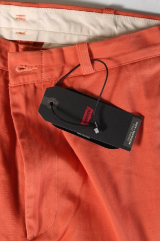 Herrenhose Levi's, Größe M, Farbe Orange, Preis 21,99 €