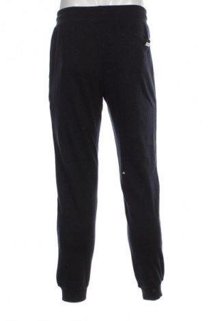 Pantaloni trening de bărbați Jack & Jones, Mărime M, Culoare Albastru, Preț 269,74 Lei