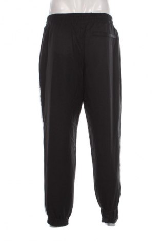 Pantaloni trening de bărbați PUMA, Mărime M, Culoare Negru, Preț 134,87 Lei