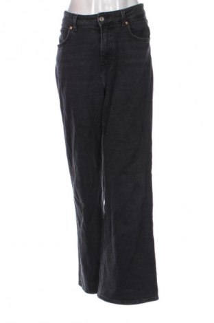 Damskie jeansy H&M, Rozmiar XL, Kolor Czarny, Cena 114,71 zł
