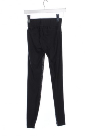 Γυναικείο κολάν Under Armour, Μέγεθος XS, Χρώμα Πολύχρωμο, Τιμή 21,99 €