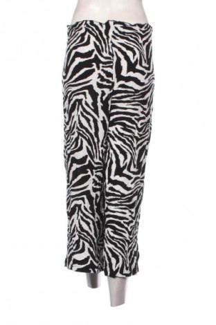 Damskie spodnie Infinity, Rozmiar XL, Kolor Kolorowy, Cena 52,99 zł
