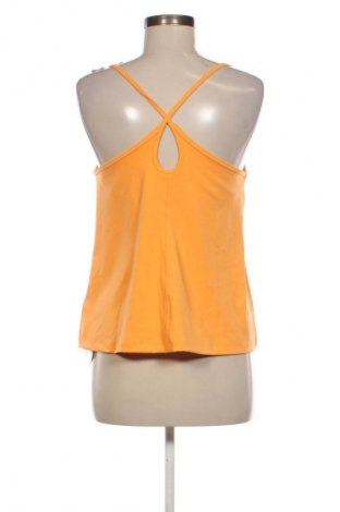 Top sport de damă. PUMA, Mărime L, Culoare Portocaliu, Preț 115,99 Lei