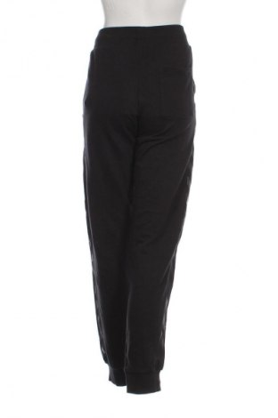 Damskie spodnie sportowe Hummel, Rozmiar M, Kolor Czarny, Cena 252,99 zł