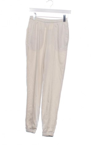 Damen Sporthose Nike, Größe XS, Farbe Beige, Preis 64,99 €