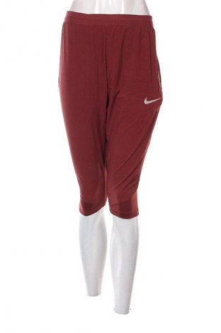Dámské tepláky Nike, Velikost L, Barva Červená, Cena  659,00 Kč