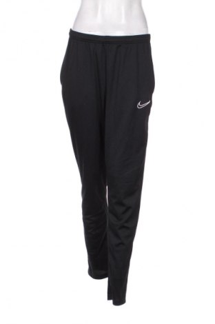 Damskie spodnie sportowe Nike, Rozmiar M, Kolor Czarny, Cena 94,25 zł
