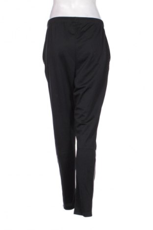 Damskie spodnie sportowe Nike, Rozmiar M, Kolor Czarny, Cena 94,25 zł