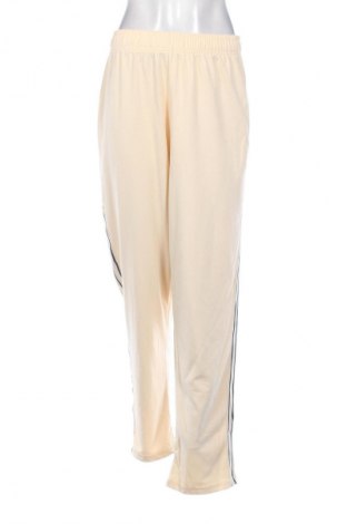 Damskie spodnie sportowe Unbranded, Rozmiar XXL, Kolor ecru, Cena 67,41 zł