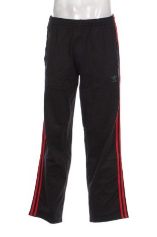 Męskie spodnie sportowe Adidas Originals, Rozmiar S, Kolor Czarny, Cena 321,99 zł