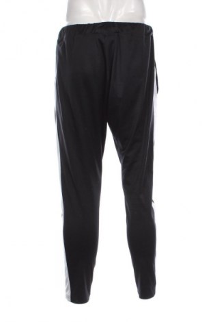 Мъжко спортно долнище Under Armour, Размер L, Цвят Черен, Цена 48,99 лв.