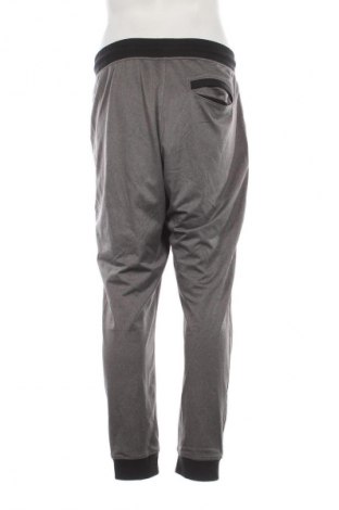 Męskie spodnie sportowe Under Armour, Rozmiar XL, Kolor Kolorowy, Cena 142,99 zł