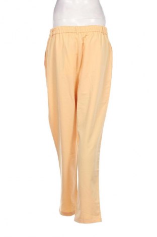 Damenhose Guido Maria Kretschmer for About You, Größe L, Farbe Gelb, Preis 13,99 €