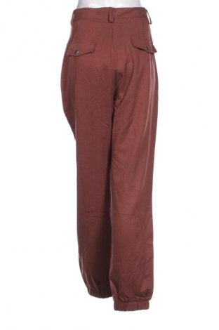 Damenhose Guido Maria Kretschmer for About You, Größe L, Farbe Braun, Preis 14,99 €