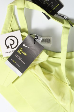 Damski sportowy top Nike, Rozmiar L, Kolor Zielony, Cena 72,37 zł