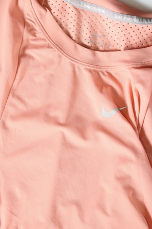 Damski sportowy top Nike, Rozmiar M, Kolor Różowy, Cena 80,46 zł