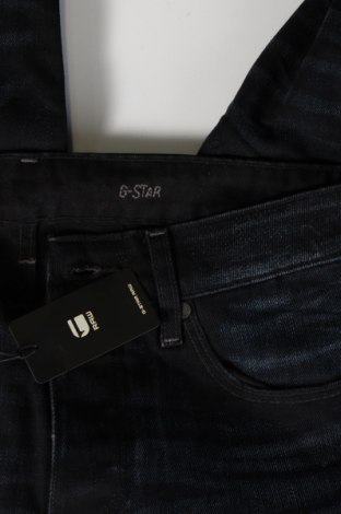 Męskie jeansy G-Star Raw, Rozmiar M, Kolor Niebieski, Cena 543,75 zł