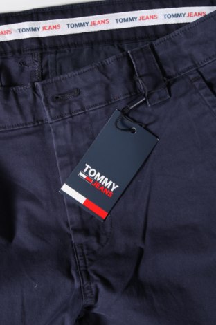 Męskie spodnie Tommy Jeans, Rozmiar M, Kolor Niebieski, Cena 458,46 zł