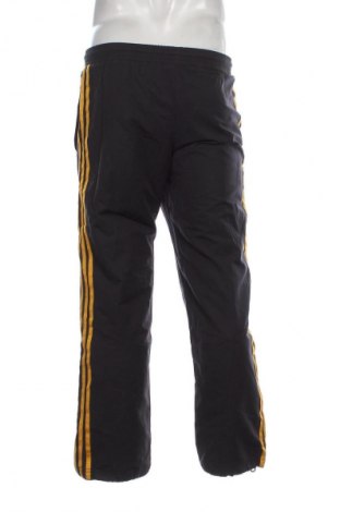 Pantaloni trening de bărbați Adidas, Mărime XS, Culoare Albastru, Preț 68,99 Lei