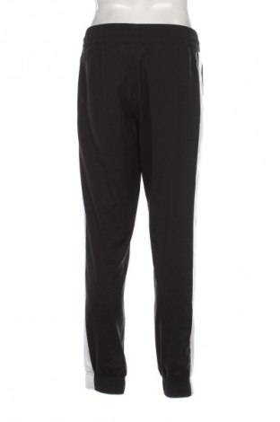 Pantaloni trening de bărbați PUMA, Mărime M, Culoare Negru, Preț 152,99 Lei