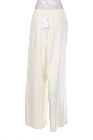 Damskie spodnie Guess, Rozmiar L, Kolor ecru, Cena 564,99 zł