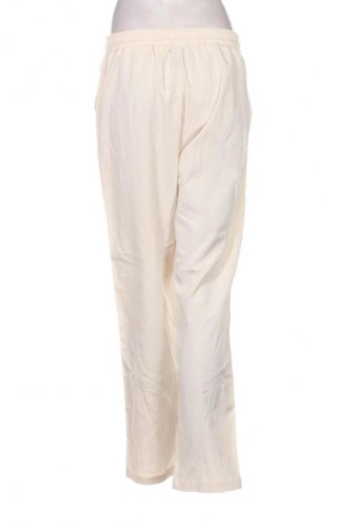 Damskie spodnie Unbranded, Rozmiar L, Kolor ecru, Cena 78,99 zł