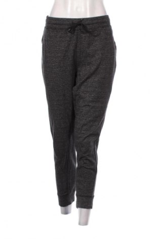 Damskie spodnie sportowe Champion, Rozmiar XL, Kolor Kolorowy, Cena 111,99 zł