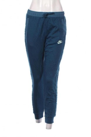 Damskie spodnie sportowe Nike, Rozmiar M, Kolor Niebieski, Cena 134,99 zł