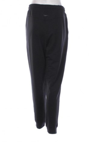 Dámské tepláky Nike, Velikost M, Barva Černá, Cena  830,00 Kč