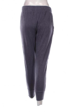 Damskie spodnie sportowe Under Armour, Rozmiar M, Kolor Fioletowy, Cena 134,99 zł