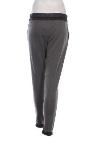 Damskie spodnie sportowe Under Armour, Rozmiar M, Kolor Szary, Cena 134,99 zł