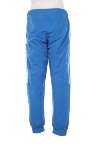 Męskie spodnie sportowe Adidas Originals, Rozmiar M, Kolor Kolorowy, Cena 157,99 zł