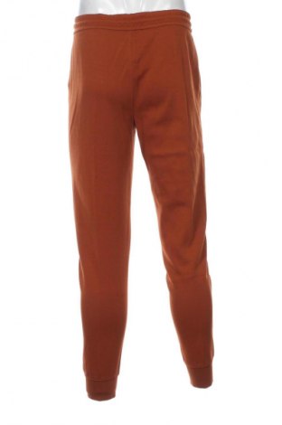Мъжко спортно долнище Calvin Klein, Размер M, Цвят Оранжев, Цена 59,99 лв.