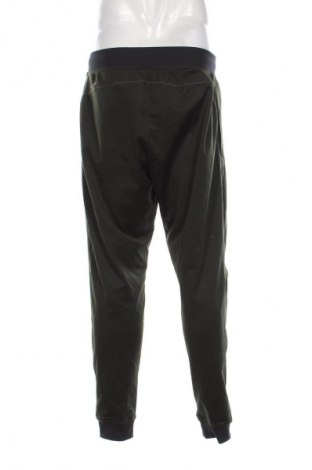 Ανδρικό αθλητικό παντελόνι Under Armour, Μέγεθος L, Χρώμα Πράσινο, Τιμή 30,99 €
