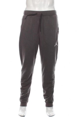 Herren Sporthose Air Jordan Nike, Größe M, Farbe Grau, 62% Baumwolle, 38% Polyester, Preis 66,81 €