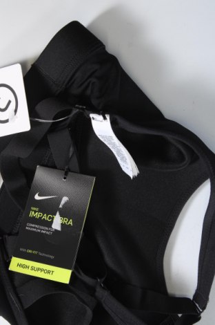 Top sport de damă. Nike, Mărime XS, Culoare Negru, Preț 170,33 Lei