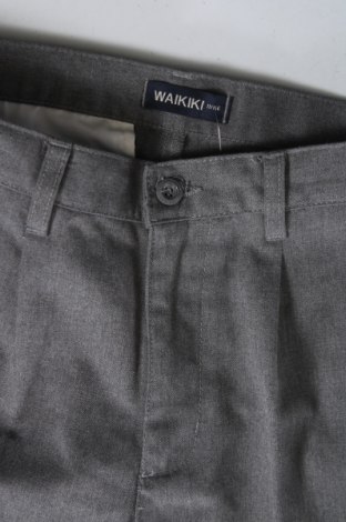 Pantaloni pentru copii LC Waikiki, Mărime 9-10y/ 140-146 cm, Culoare Gri, Preț 24,99 Lei