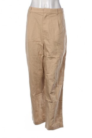 Damskie spodnie Uniqlo, Rozmiar L, Kolor Beżowy, Cena 134,99 zł