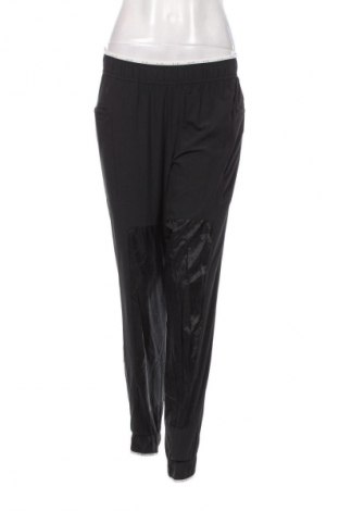 Dámske tepláky Nike, Veľkosť M, Farba Čierna, Cena  54,95 €