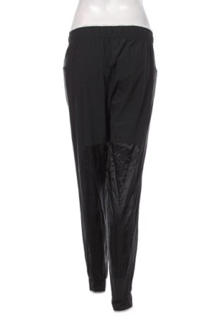 Dámske tepláky Nike, Veľkosť M, Farba Čierna, Cena  54,95 €