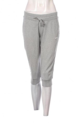 Damskie spodnie sportowe Nike, Rozmiar M, Kolor Szary, Cena 94,25 zł