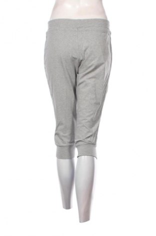 Damskie spodnie sportowe Nike, Rozmiar M, Kolor Szary, Cena 94,25 zł