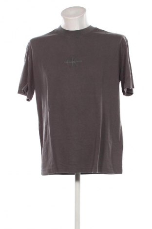 Herren T-Shirt Calvin Klein Jeans, Größe M, Farbe Grau, Preis 57,99 €