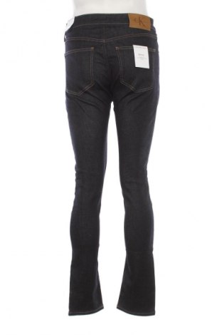 Męskie jeansy Calvin Klein, Rozmiar S, Kolor Niebieski, Cena 659,99 zł