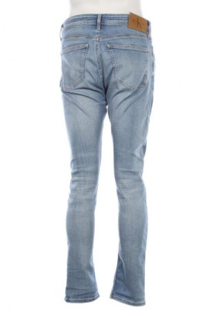 Męskie jeansy Calvin Klein, Rozmiar M, Kolor Niebieski, Cena 199,99 zł