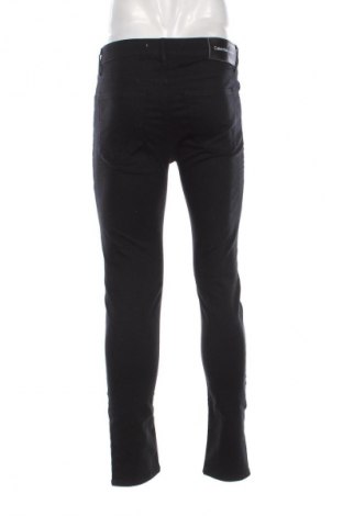 Pánske džínsy  Calvin Klein Jeans, Veľkosť M, Farba Čierna, Cena  49,95 €