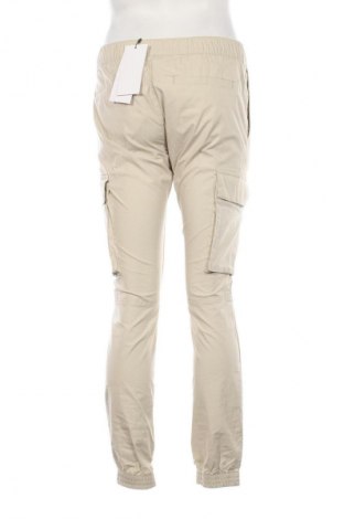 Pánske nohavice  Calvin Klein Jeans, Veľkosť S, Farba Kremová, Cena  97,95 €